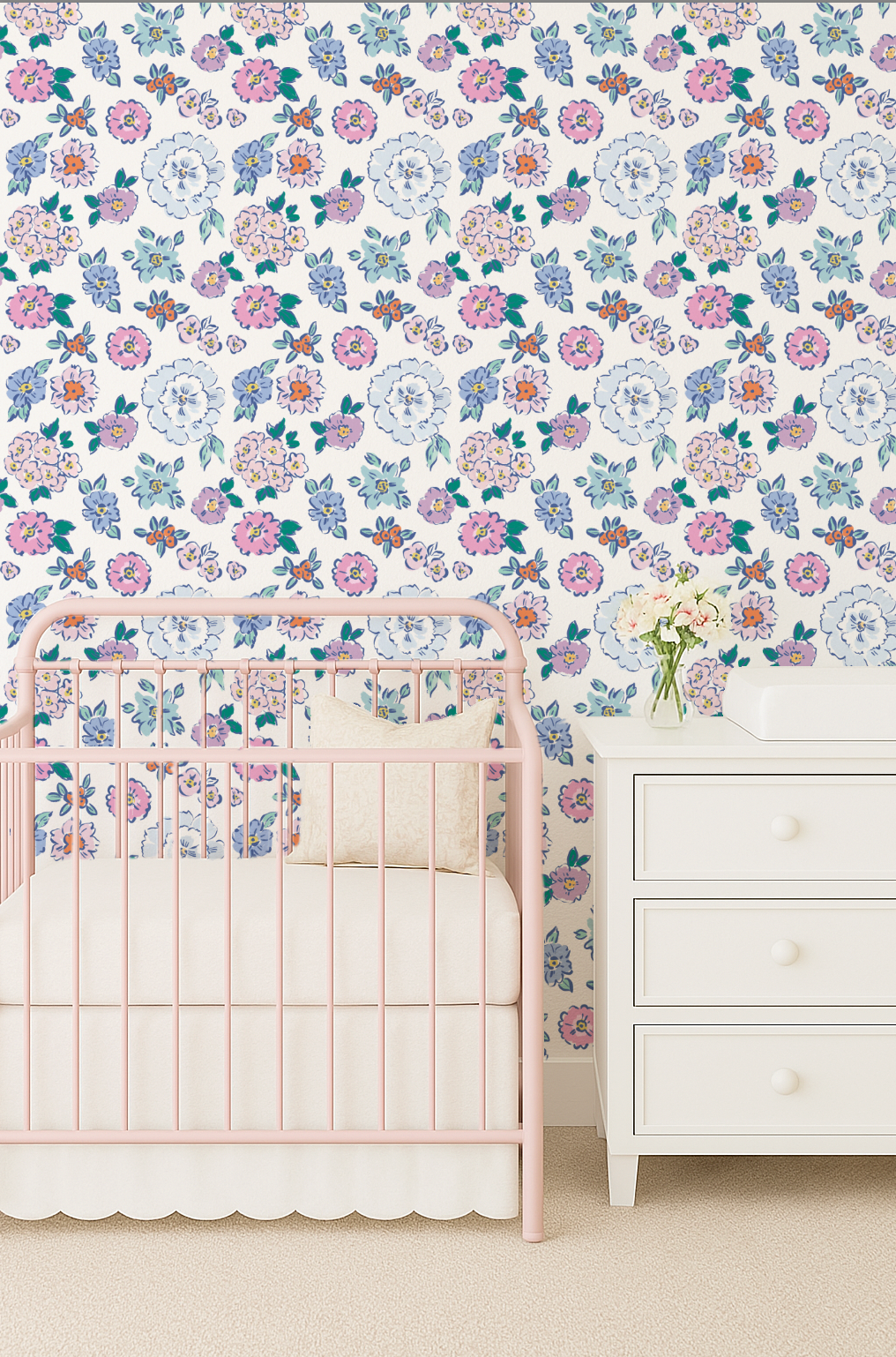 Nursery room with floral wallpaper, pink crib, and white dresser.