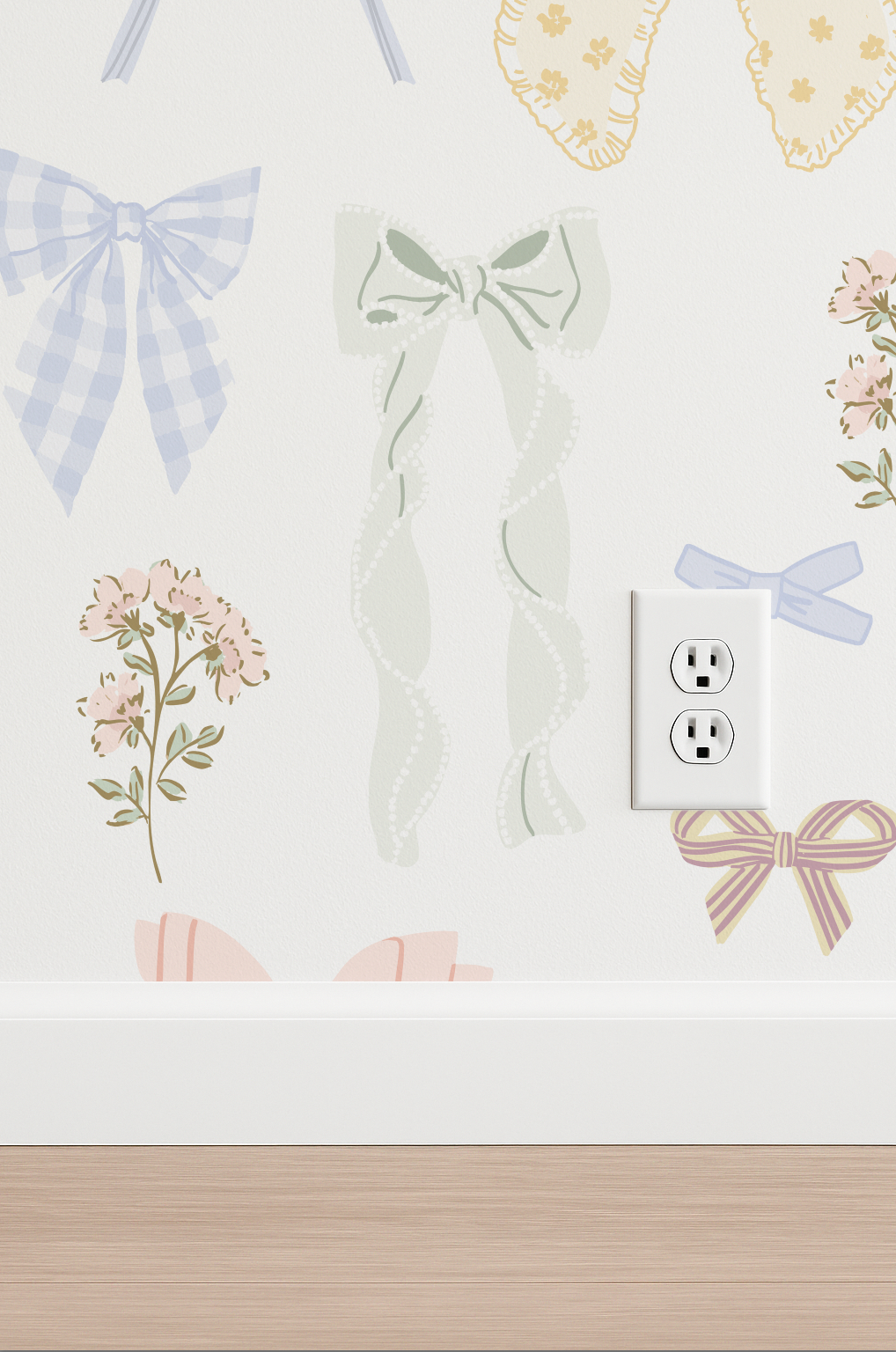 Decorative wall stickers with bows, flowers, and a power outlet on a light-colored wall.