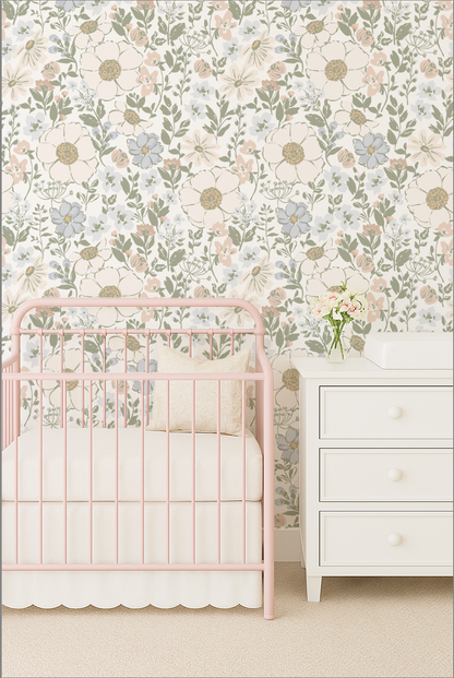 Nursery with floral wallpaper, pink crib, and white dresser.