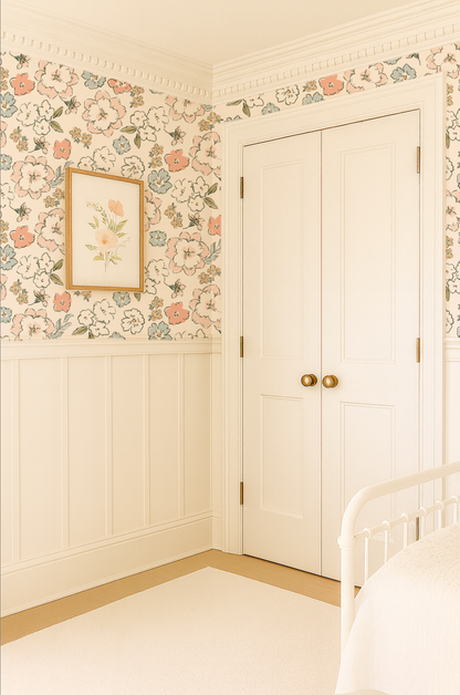 Decorative interior with floral wallpaper, framed picture, and white door.