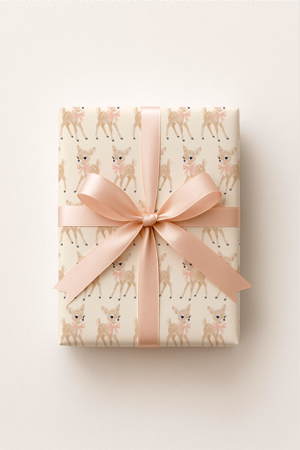 cute baby deer vintage eyes with pink bow for girls gift wrapping on present with ribbon and bow.