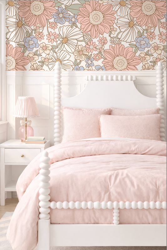 Bedroom with floral wallpaper, pink bedding, and a white nightstand.