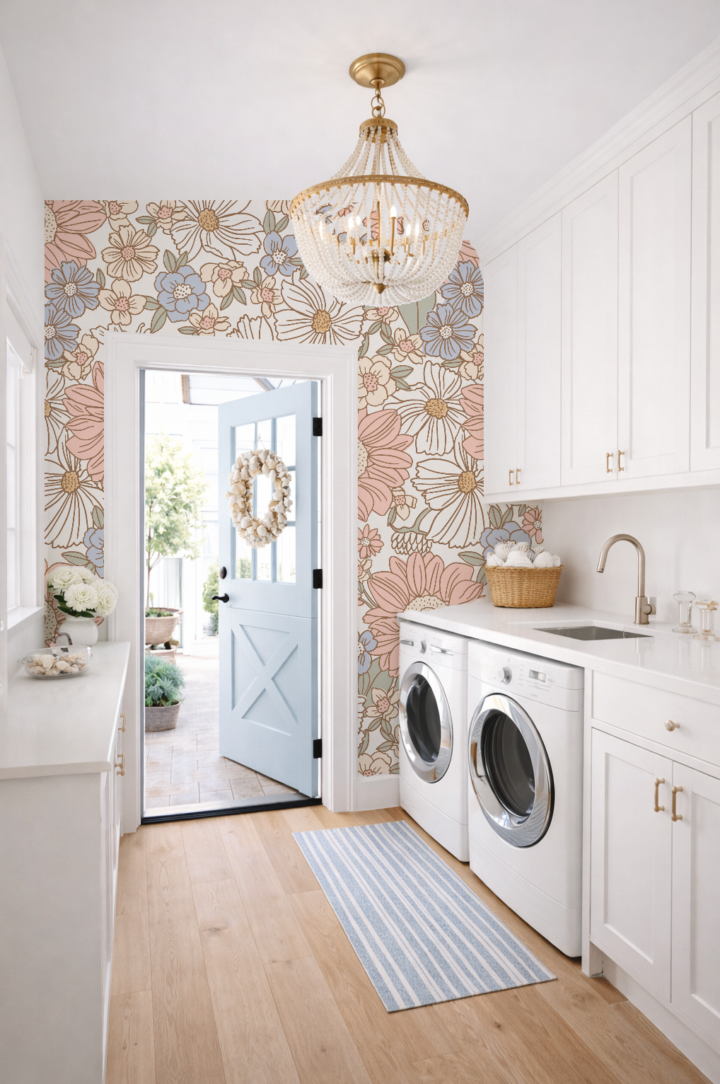 Modern laundry room with floral wallpaper, washer, dryer, and decorative elements.