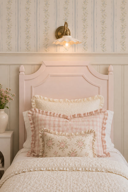 Blueberry vines wallpaper with sage and gold on cream in a cozy bedroom setting.