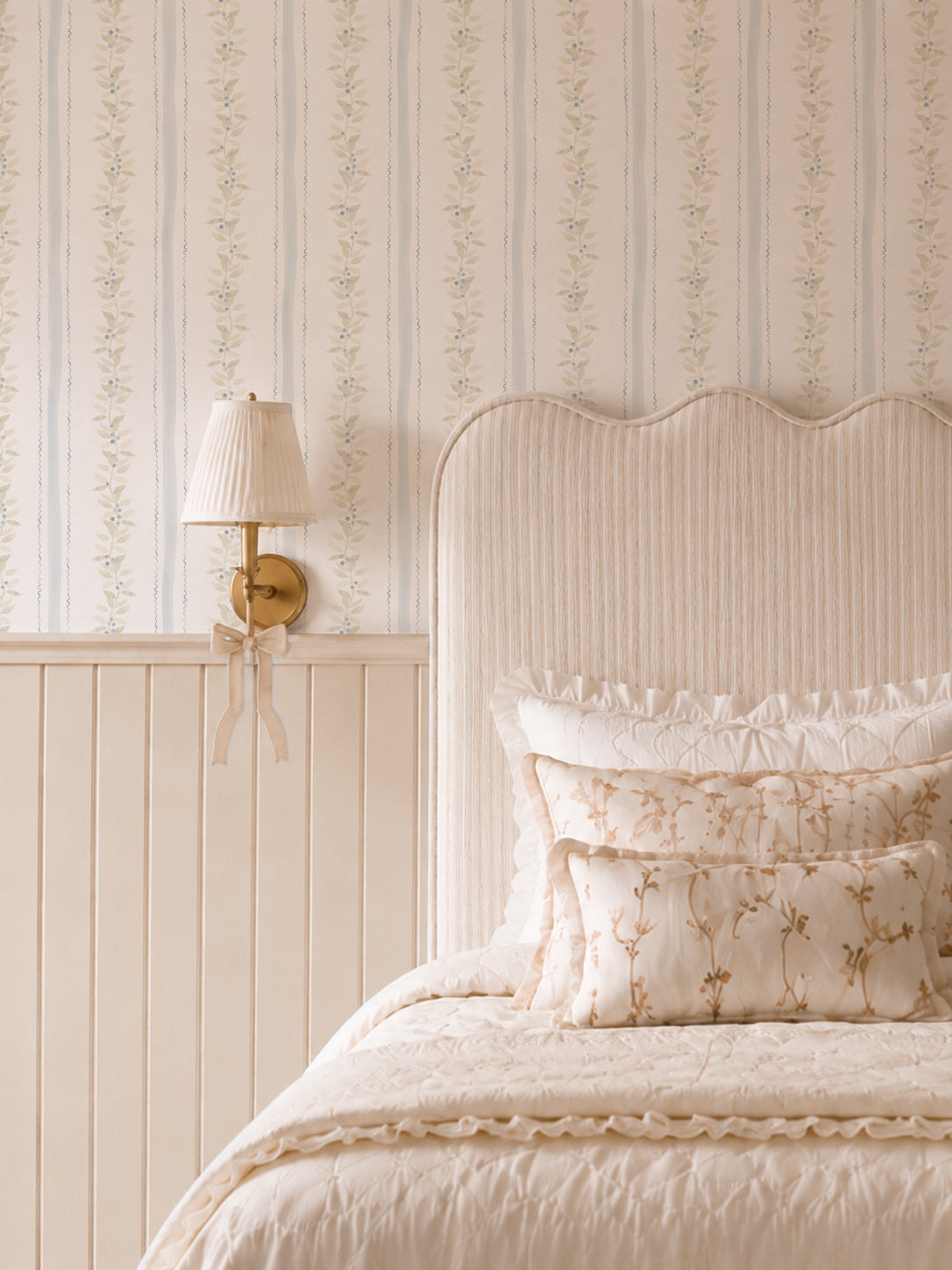 Cream bedroom with Blueberry Vines wallpaper featuring sage and gold vines on cream background.