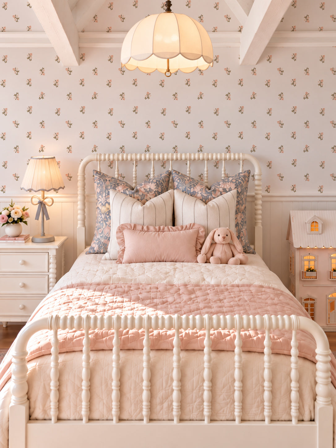 Blush floral wallpaper in cozy bedroom with vintage decor and soft pink accents.