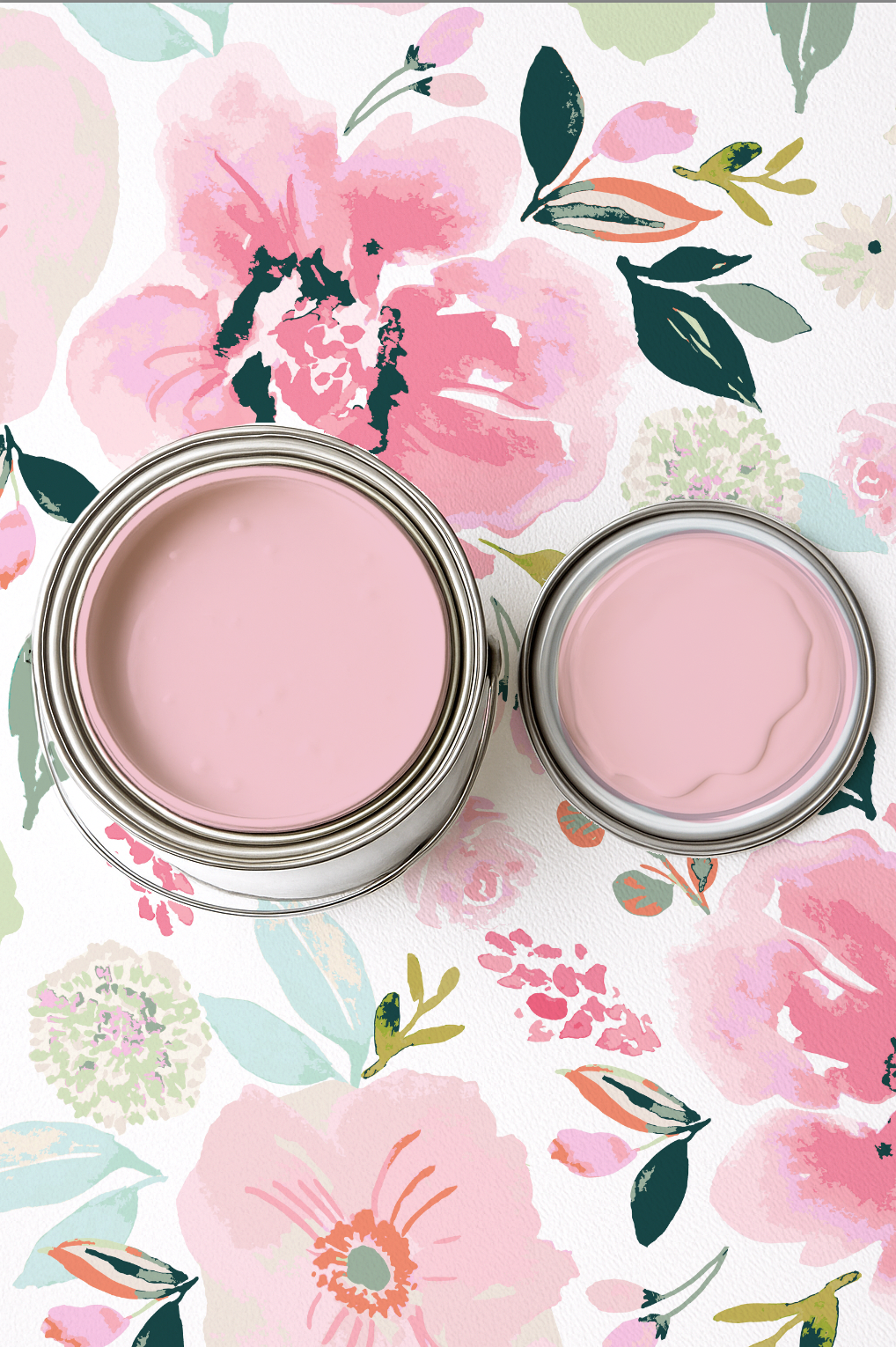 Two cans of pink paint on a floral background
