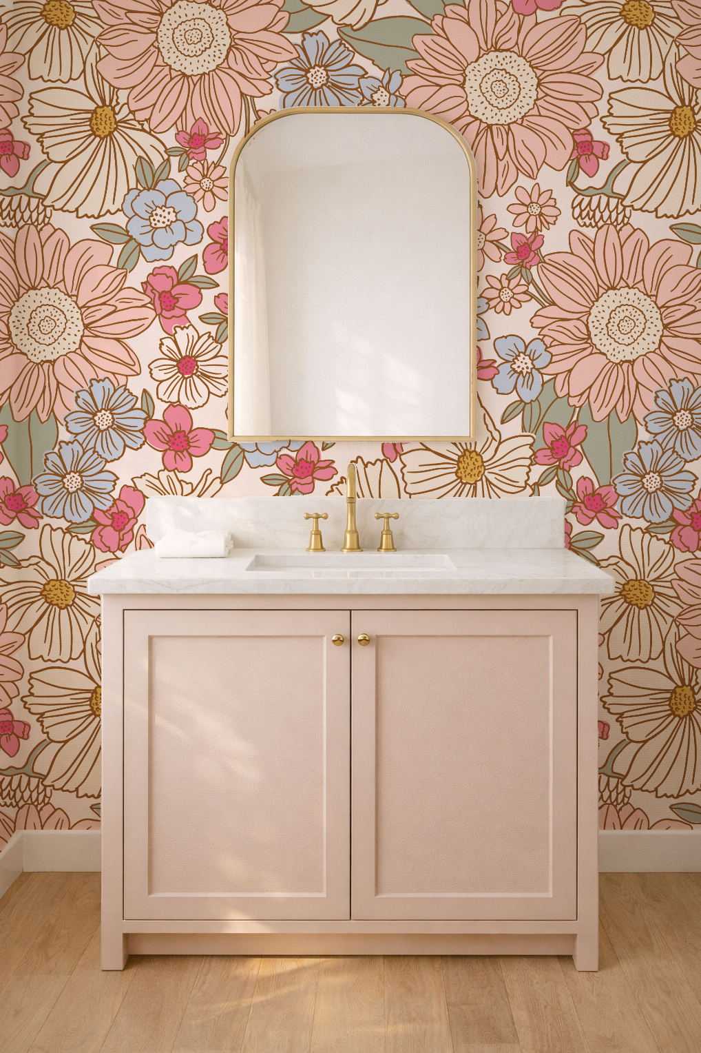 Bathroom vanity with floral wallpaper and a mirror.
