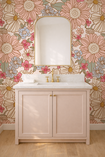 Bathroom vanity with floral wallpaper and a mirror.