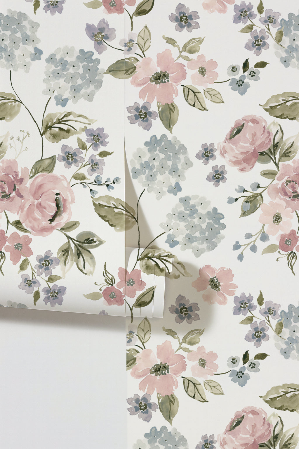 Floral wallpaper with blush pink and light blue hydrangeas on a white background.