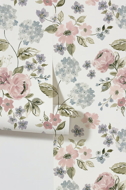 Floral wallpaper with blush pink and light blue hydrangeas on a white background.