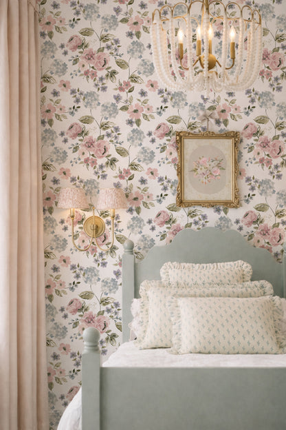 Floral wallpaper with blush pink and light blue hydrangeas in elegant bedroom setting.