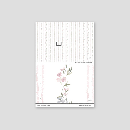 Lacey Lou wallpaper sample with vertical floral motifs in pink, blue, and green on white