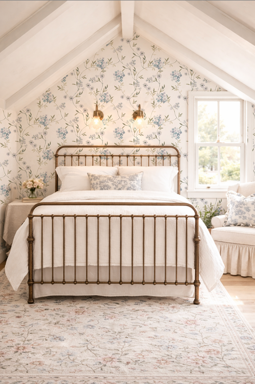 Bedroom with floral lavender hydrangea wallpaper, metal bed, and soft lighting.