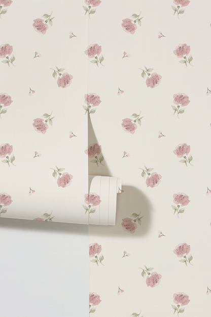 Soft pink floral wallpaper with watercolor effect on creamy background.