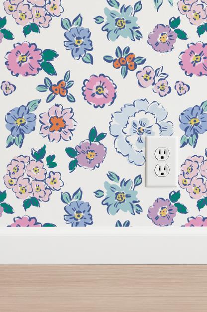 Floral wallpaper with colorful flowers on a white wall, featuring an electrical outlet.
